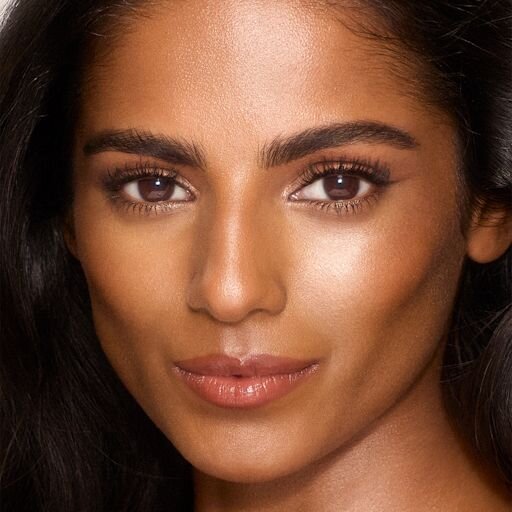 STICK FOND DE TEINT HYDRATANT UNREAL SKIN SHEER GLOW TINT 9 TAN